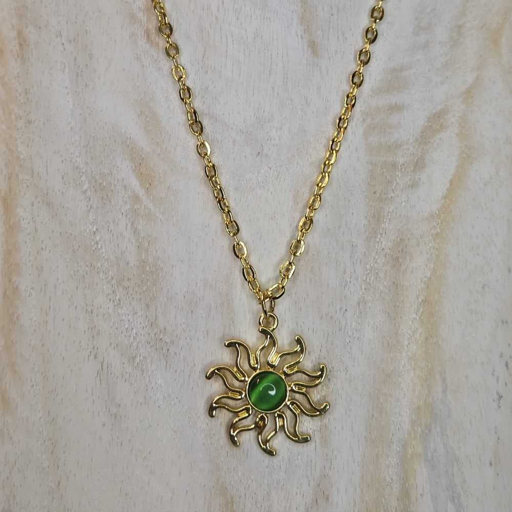 Gold Sun Pendant Necklace with Green Center